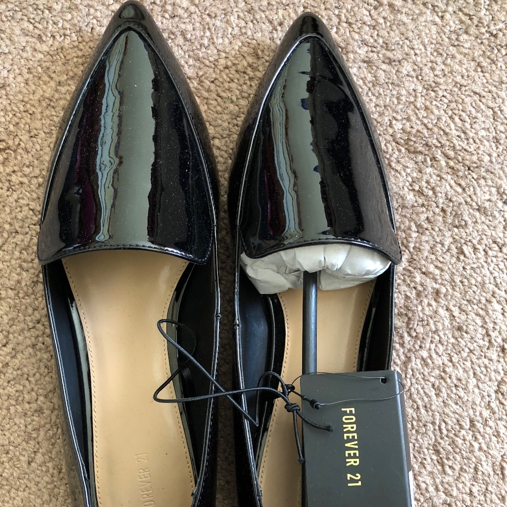 Shiny black flats